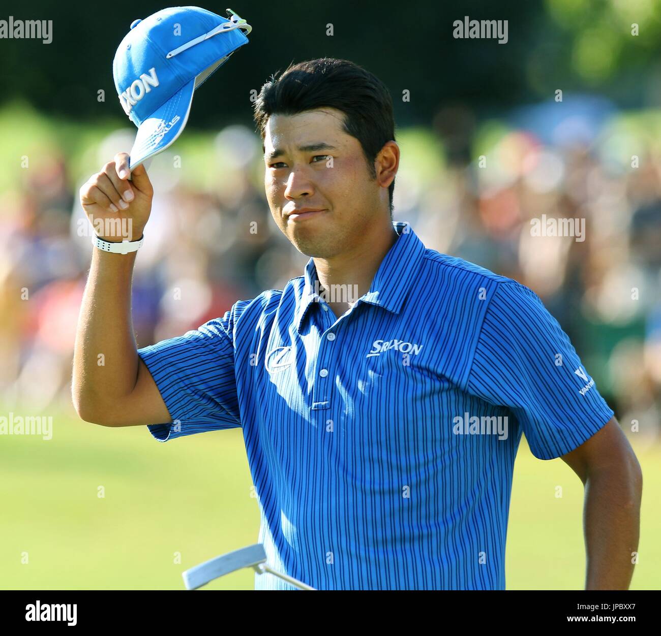 Japanese golfer Hideki Matsuyama acknowledges the gallery after 