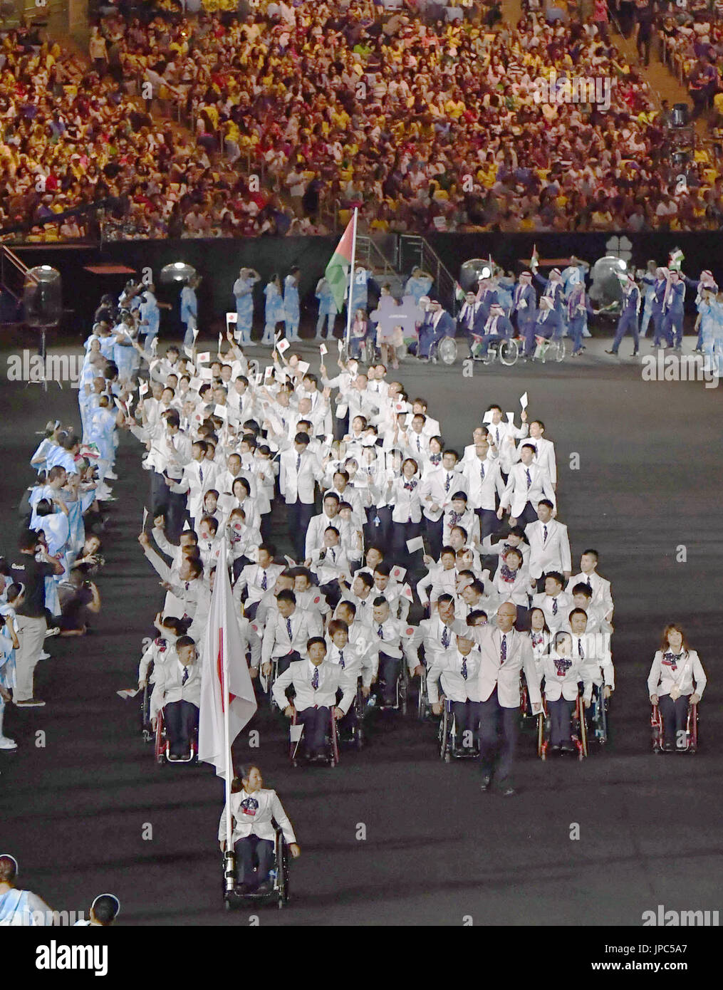 Japanese athletes march during the opening ceremony of the Rio de ...