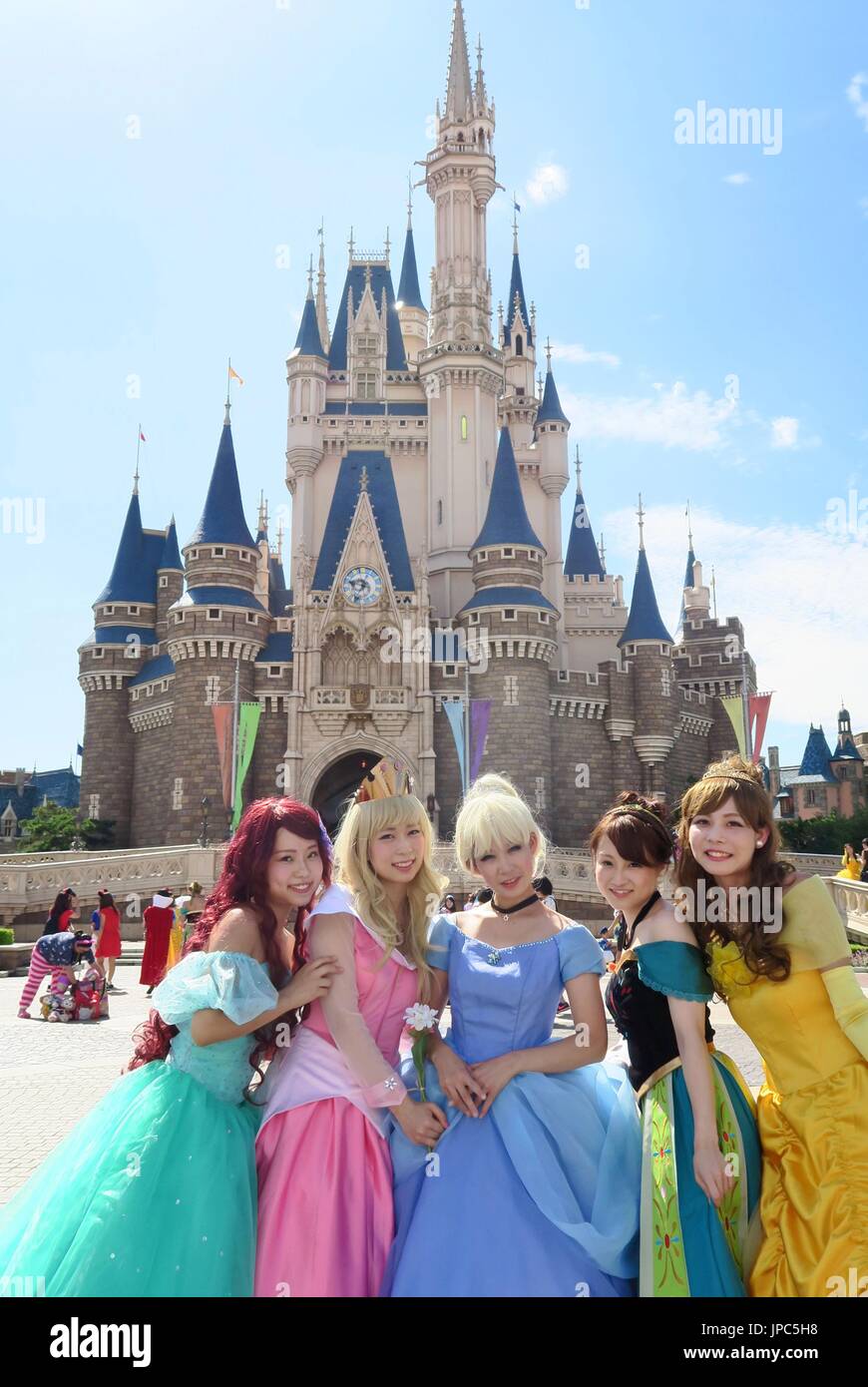 Visitors dress up as Disney characters for the Halloween event at Tokyo ...