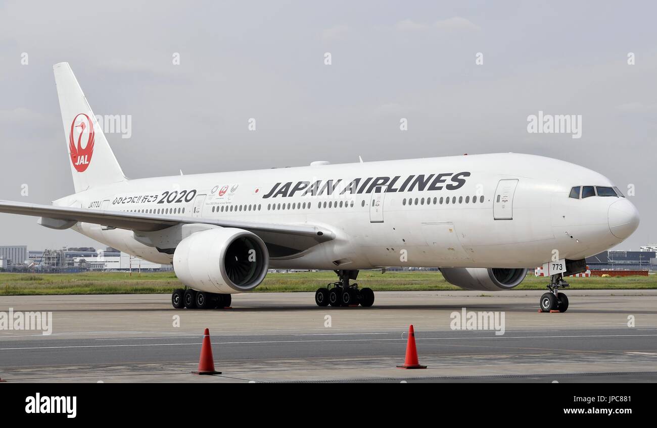 A Japan Airlines Co. plane with the logos of the 2020 Tokyo Olympics