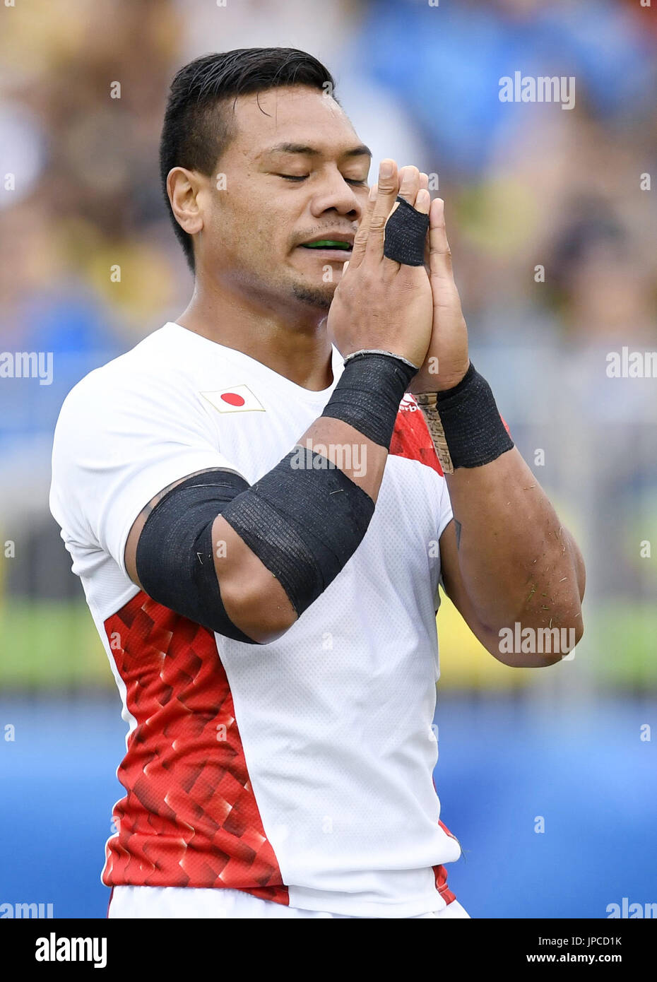 Japan's Lomano Lava Lemeki poses before kicking a conversion during the