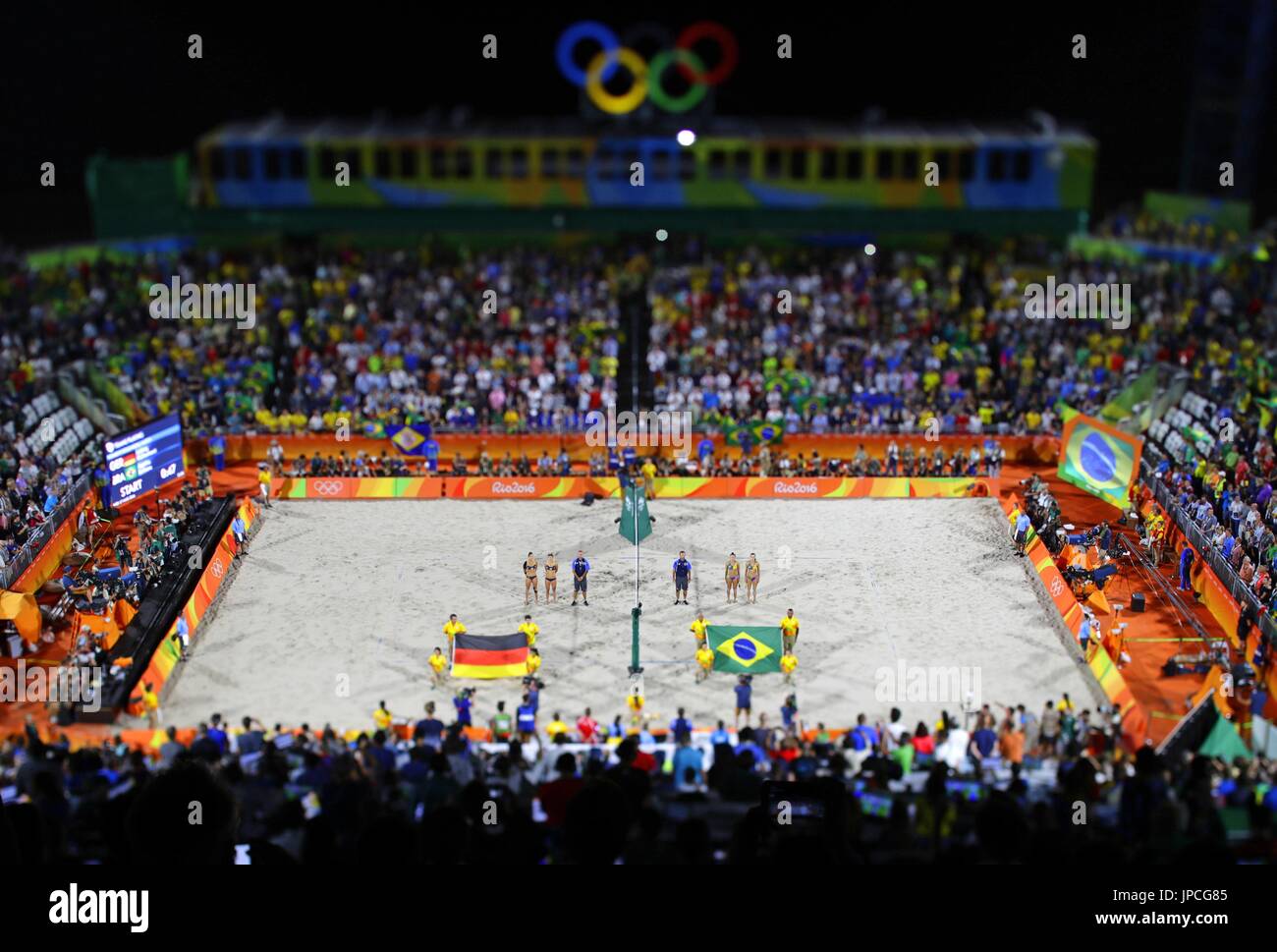 The women's beach volleyball final begins shortly before midnight at a