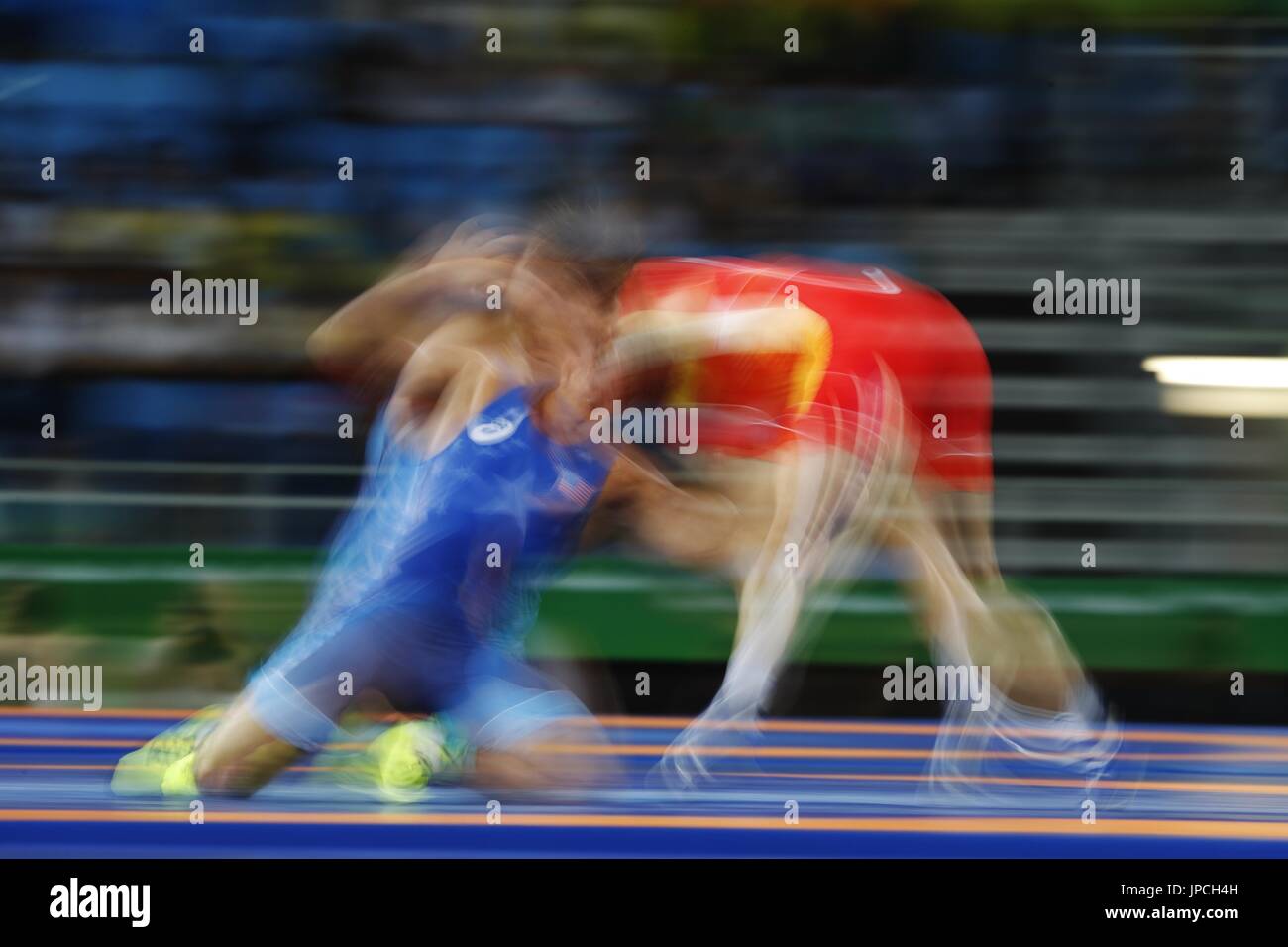 Wrestlers Andriy Kvyatkovskyy (R) of Ukraine and Frank Aniello Molinaro