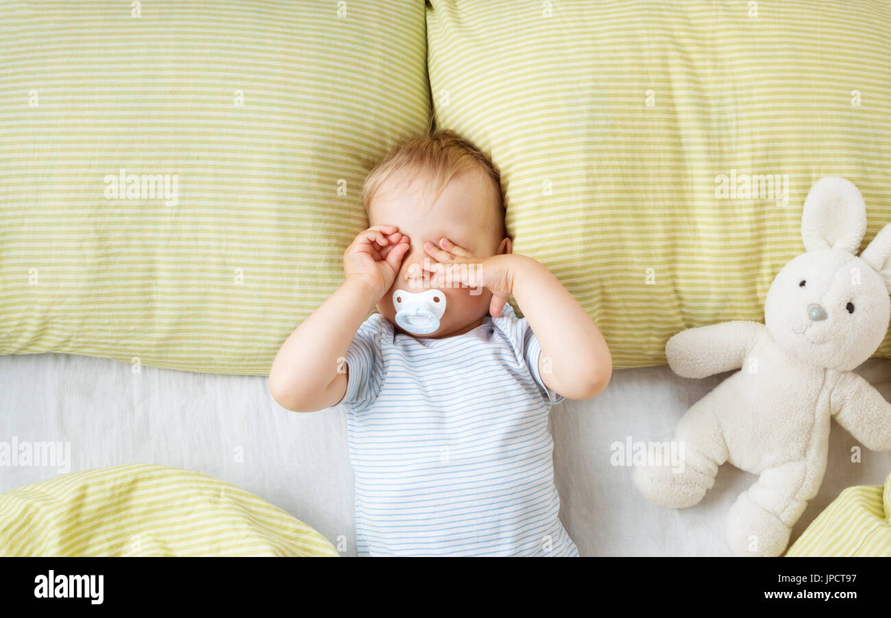 One year old baby in the bed Stock Photo Alamy