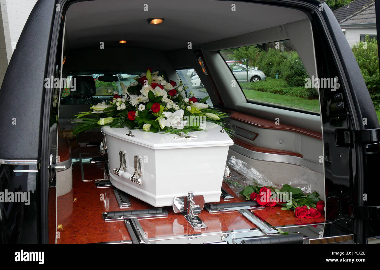funeral casket or coffin inside the hearse or at church, chapel Stock