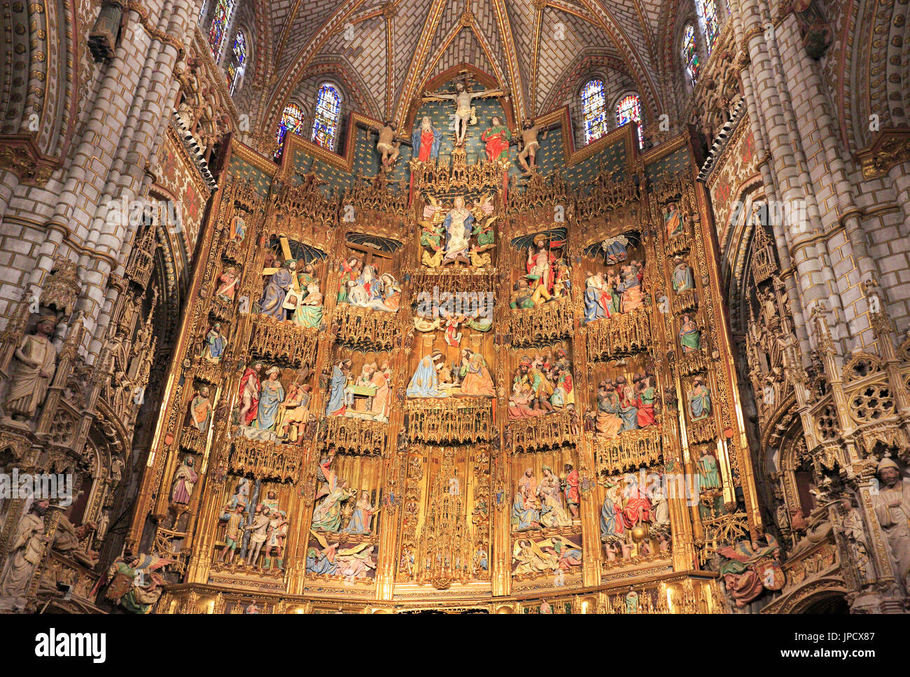 The Main altar in the interior of the Primate Cathedral of Saint Mary of Toledo, a Roman Catholic 13th-century High Gothic UNESCO cathedral. Stock Photo