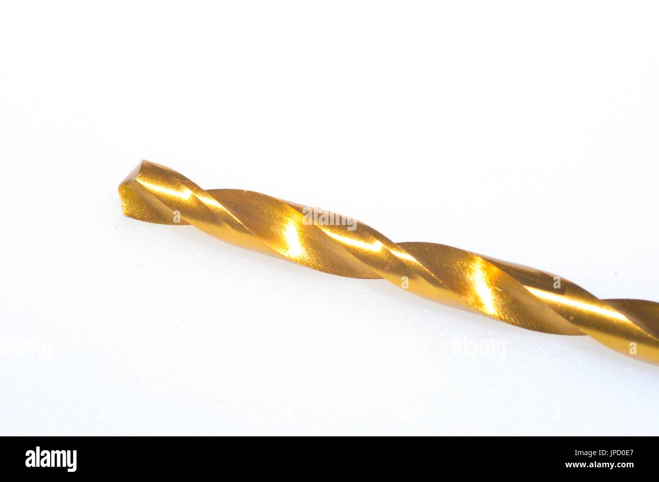 Gold colored drill bit Stock Photo Alamy