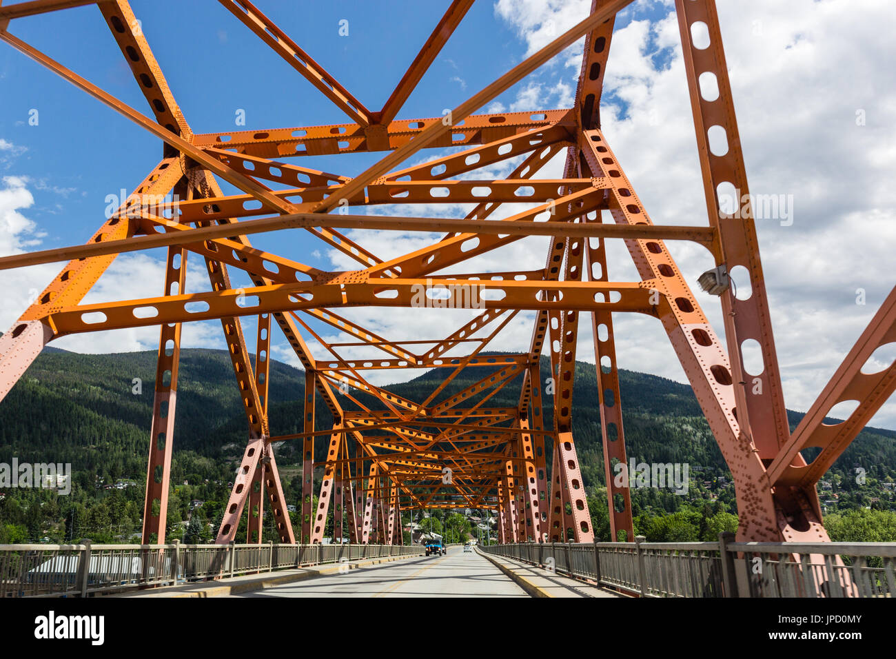 West Arm Bridge (Big Orange Bridge) over Kootenay River in Nelson, BC, Canada Stock Photo