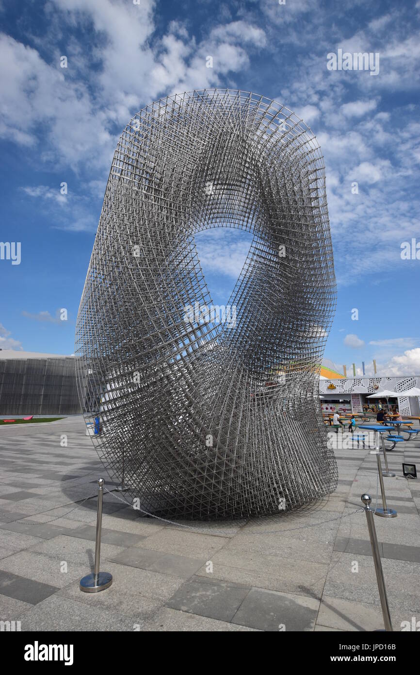 A model looks at logos of Louis Vuitton projected on a wall at the Louis  Vuitton area inside the France Pavilion in the Expo site in Shanghai, China  Stock Photo - Alamy