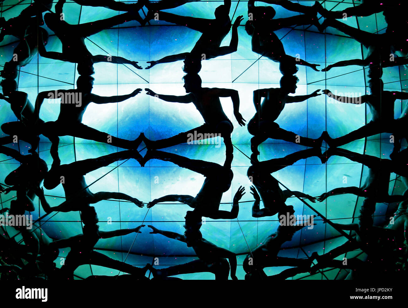 A member of Head First Acrobats performs inside the giant kaleidoscope at Camera Obscura and World of Illusions, Edinburgh, ahead of their Fringe Festival show Elixir. Stock Photo