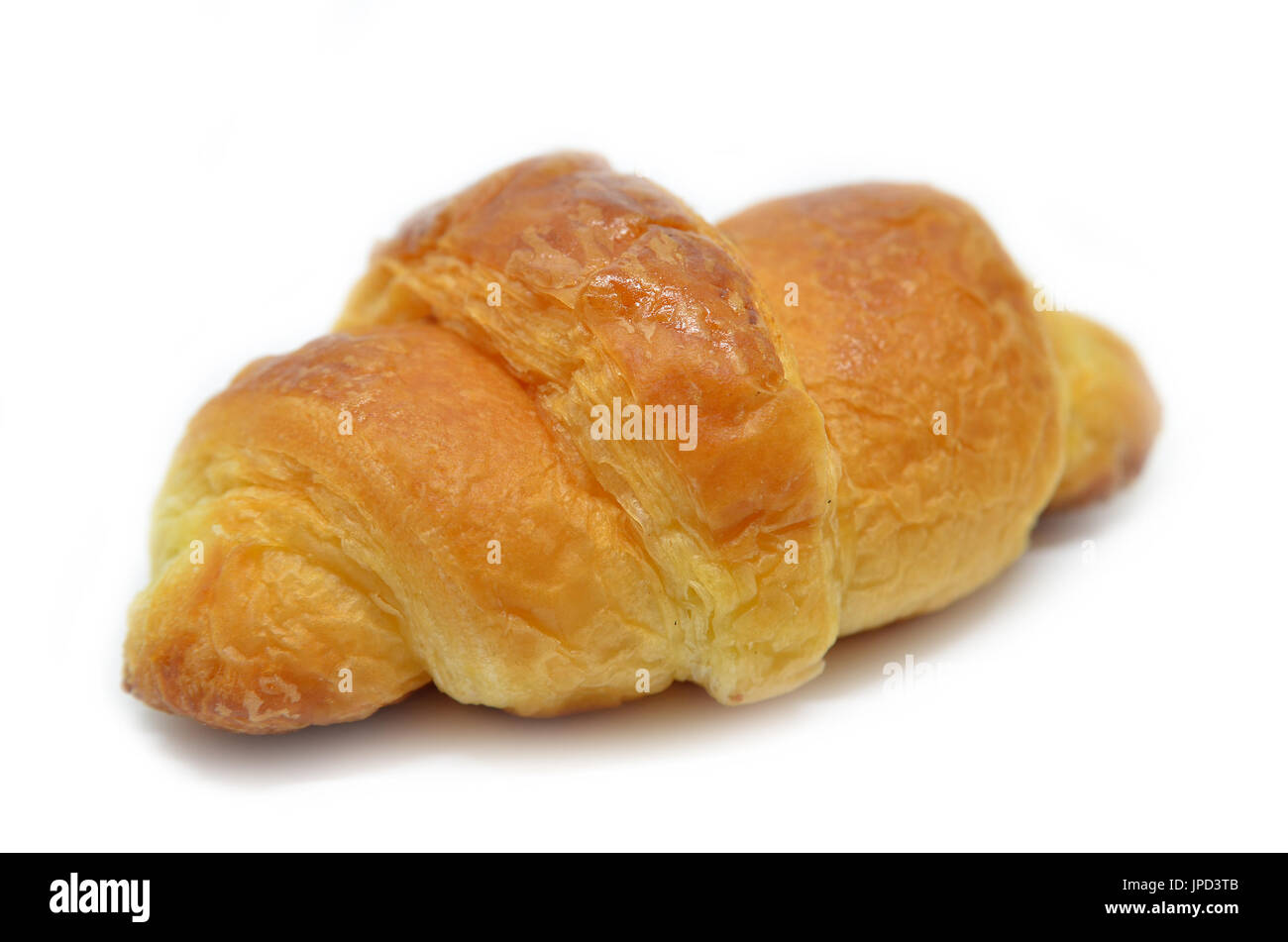 Fresh baked croissant isolated on white background Stock Photo - Alamy
