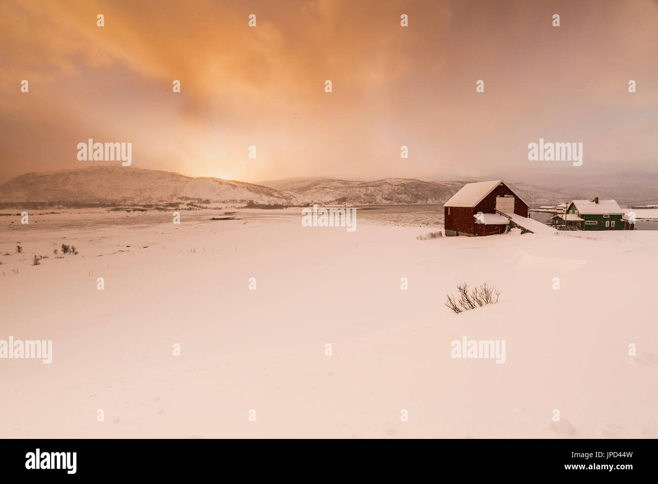 Typical norwegian warm and cozy house located at the lakeside at a