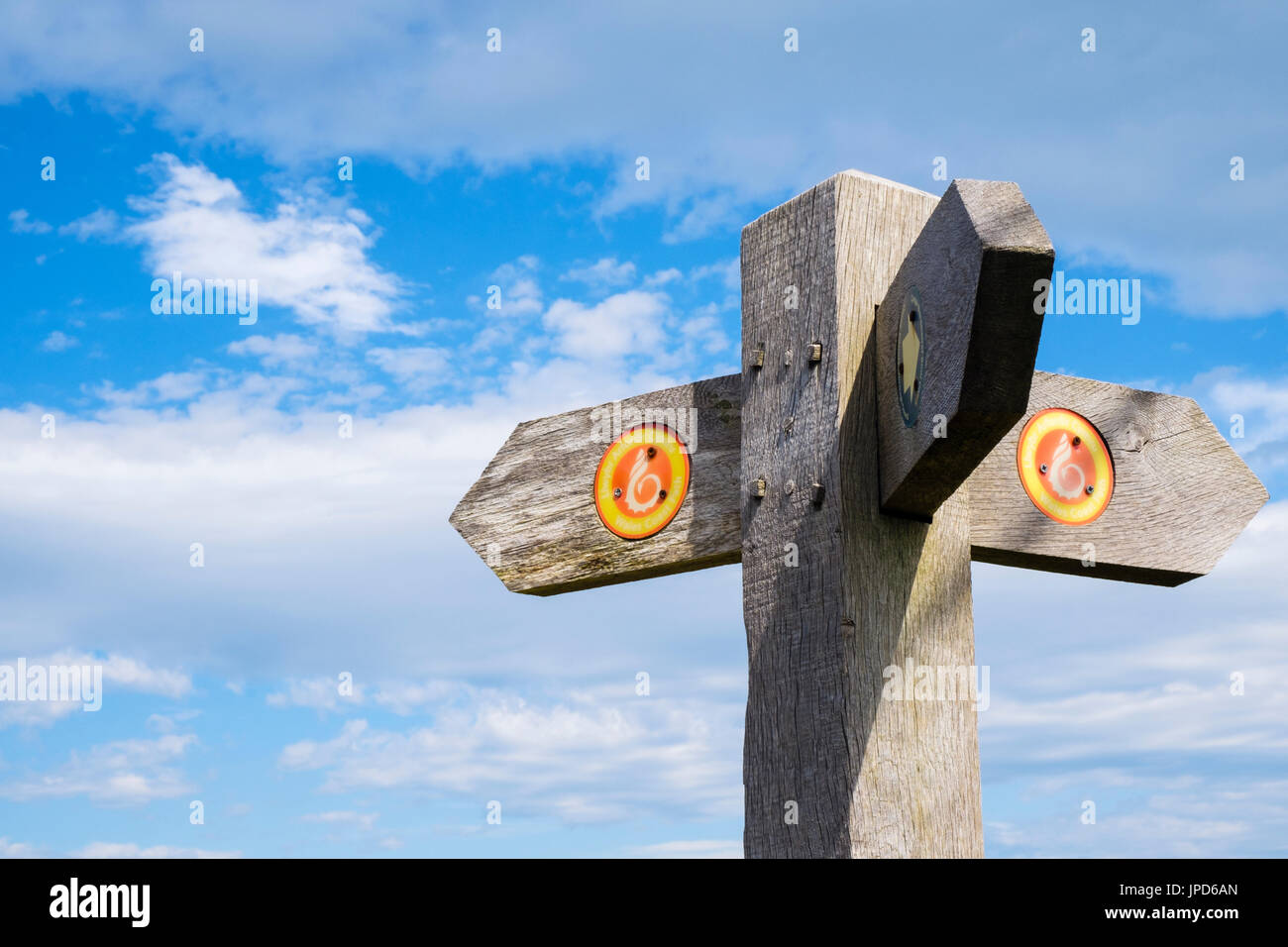 Wales Coast Path signpost and logo on Foel Lus in northern Snowdonia National Park. Penmaenmawr, Conwy, North Wales, UK, Britain Stock Photo