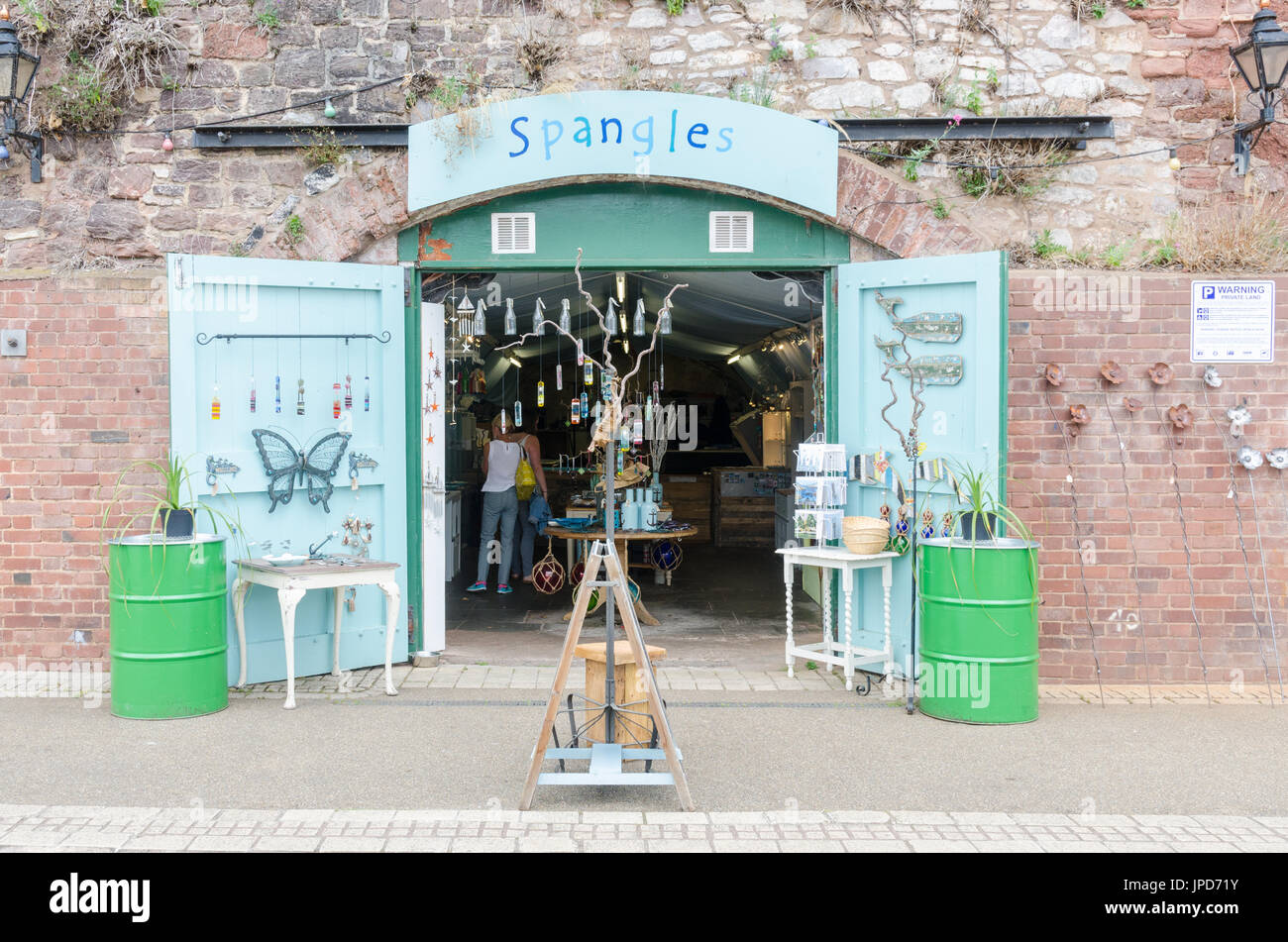 Shop in the cellars on The Quay on the bank of the River Exe in Exeter, Devon Stock Photo