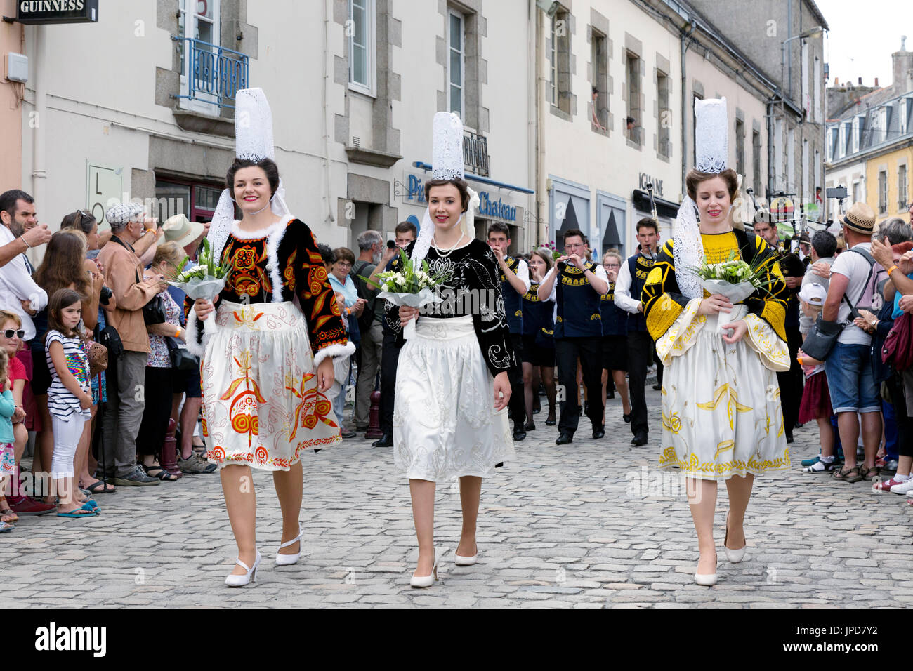 Brittany France - women in traditional costume and hats parading in the streets of Pont l'Abbe for the Fete des Brodeuses festival, Brittany France Stock Photo