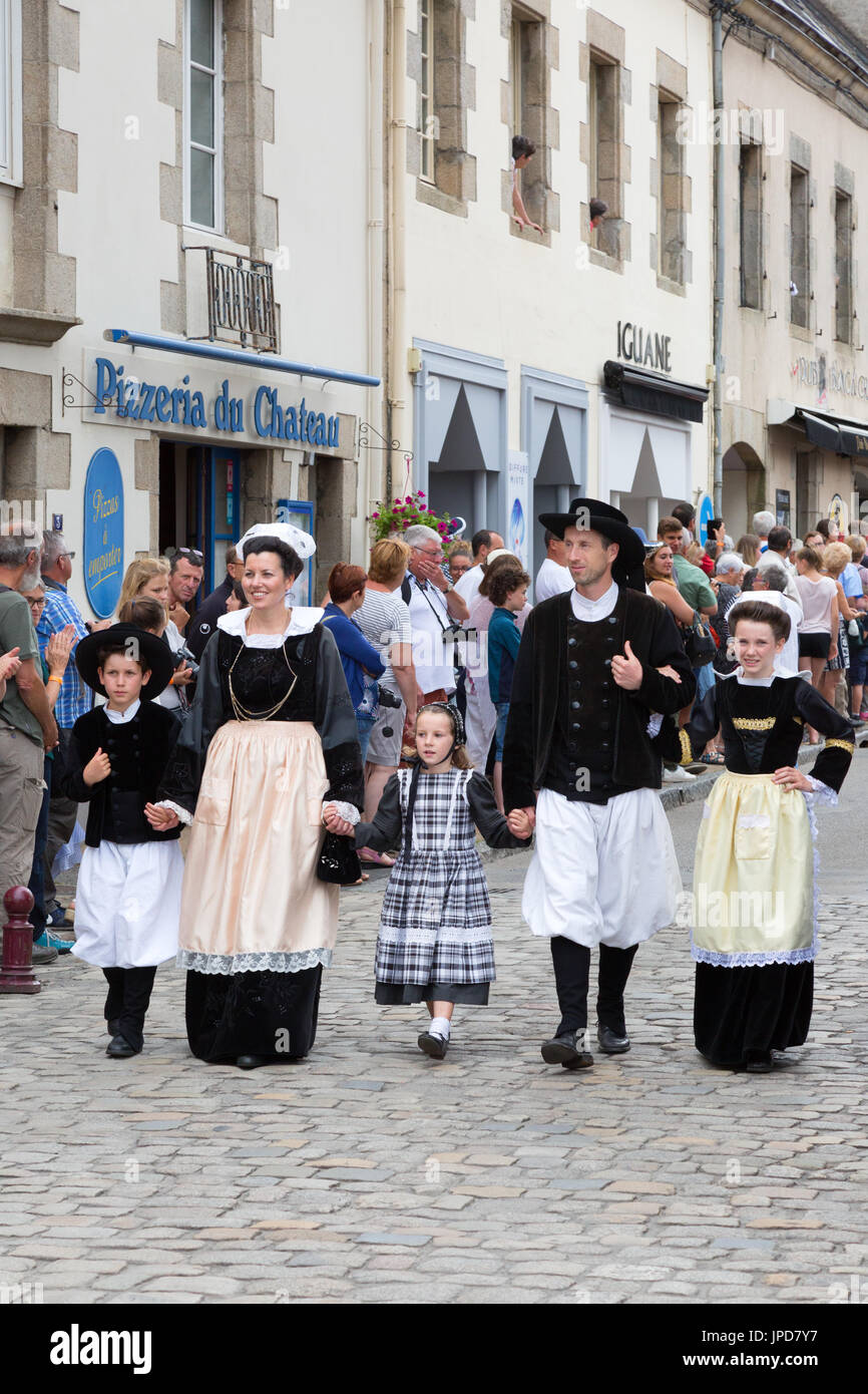 Brittany France - family in traditional costume parading in the streets of Pont l'Abbe for the Fete des Brodeuses, Brittany France Europe Stock Photo
