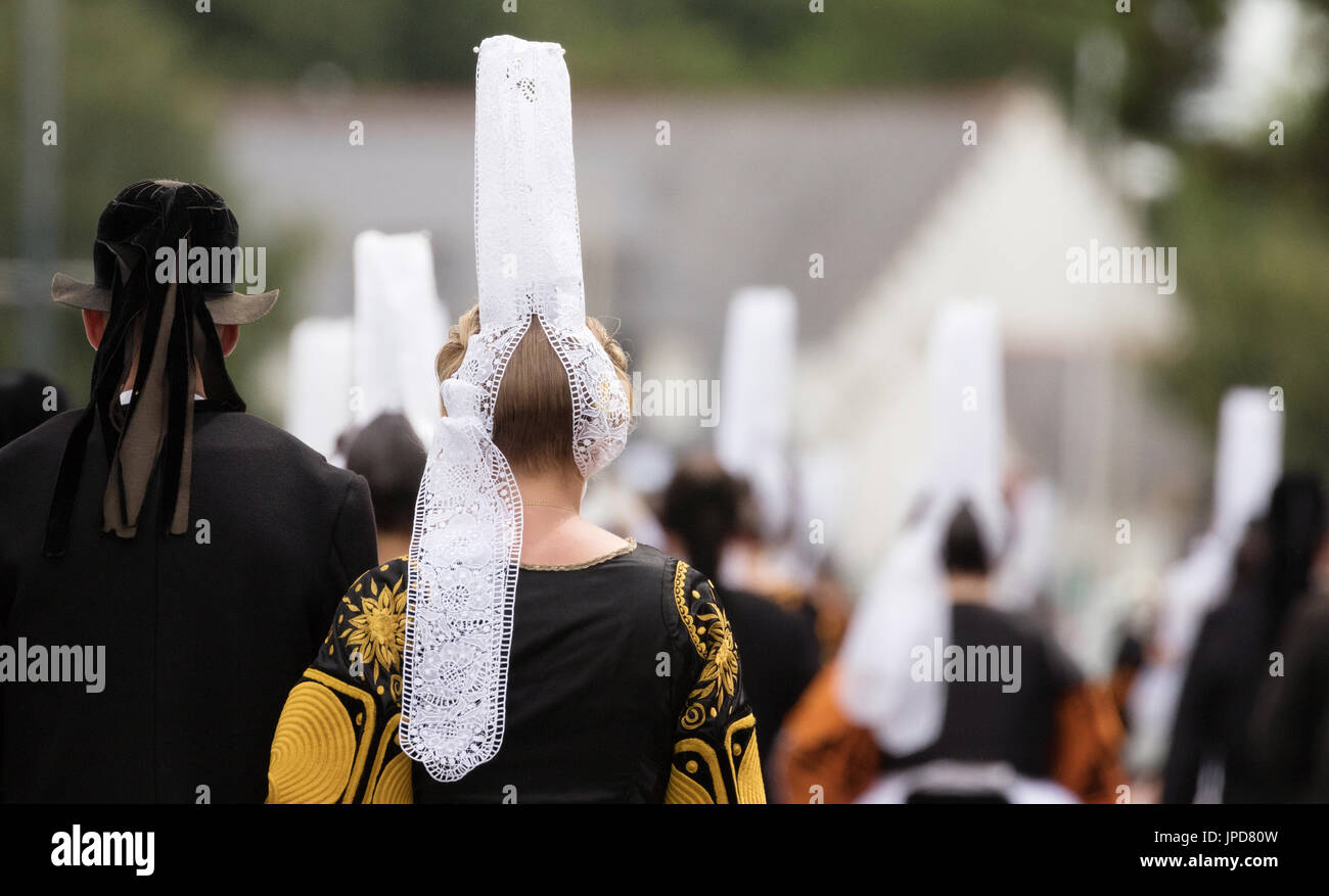 Brittany France - people parading in traditional costume at the Fete des Brodeuses, Pont L'Abbe, Bigouden, Finistere, Brittany France Stock Photo