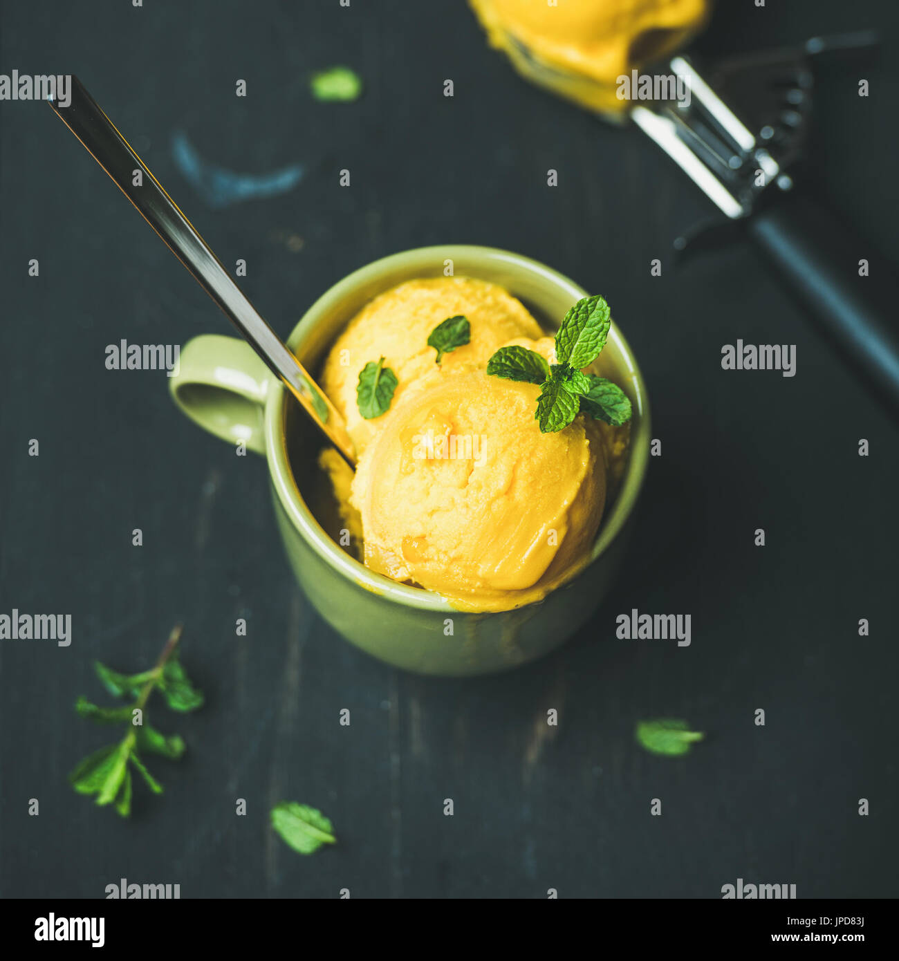 Mango sorbet ice cream scoops with mint, square crop Stock Photo - Alamy Mango sorbet ice cream scoops with mint, square crop Stock Photo - Alamy