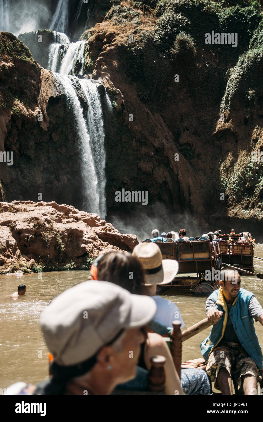 Tourists on boats at the Ouzoud falls in Morocco. Stock Photo
