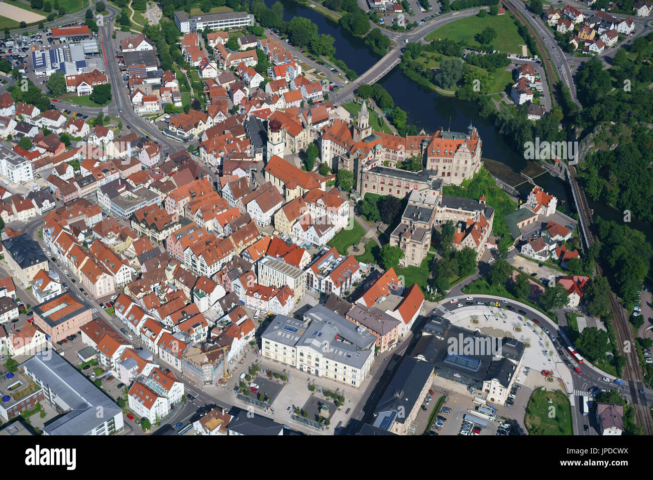 AERIAL VIEW. Medieval castle perched above the Danube River. Sigmaringen, Baden-Wurttemberg, Germany. Stock Photo