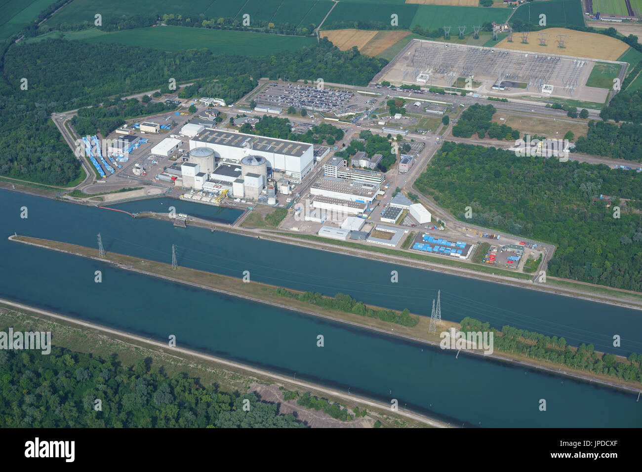 AERIAL VIEW. Fessenheim nuclear power plant alongside the Grand Canal d'Alsace. Haut-Rhin, Alsace, Grand Est, France. Stock Photo