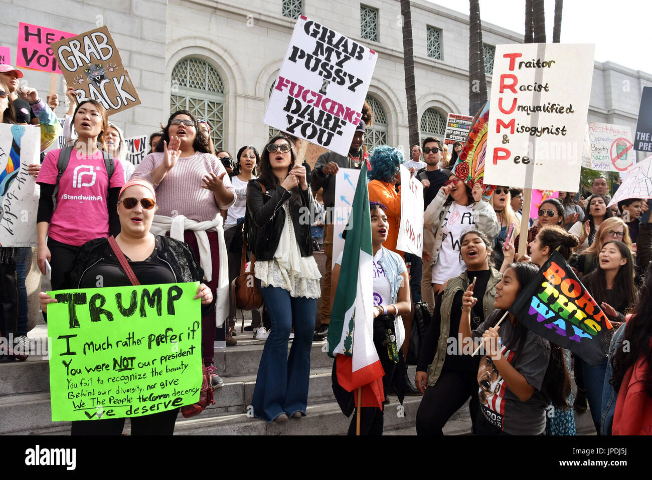 People rally outside the Los Angeles City Hall as part of Women's ...