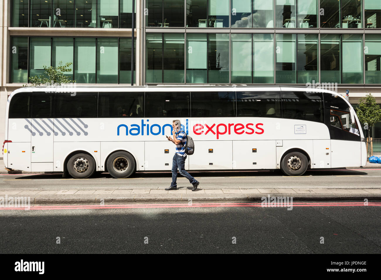 A National Express coach near Victoria Coach Station in London, UK Stock Photo