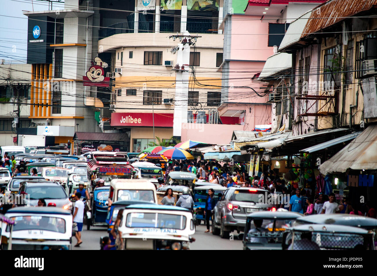 Street scene with tricycle taxis, Malvar Road, Puerto Princesa, Palawan