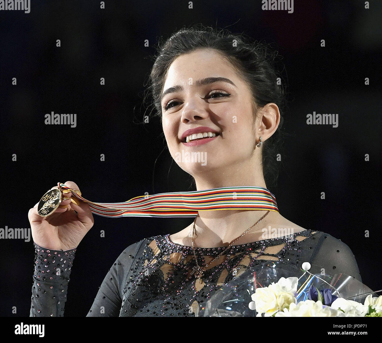 Russia's Evgenia Medvedeva acknowledges the crowd after winning the