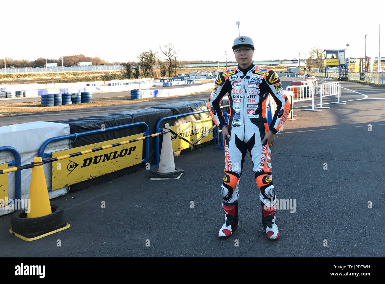 Japanese motorcycle racer Hikari Okubo poses for a photo after running