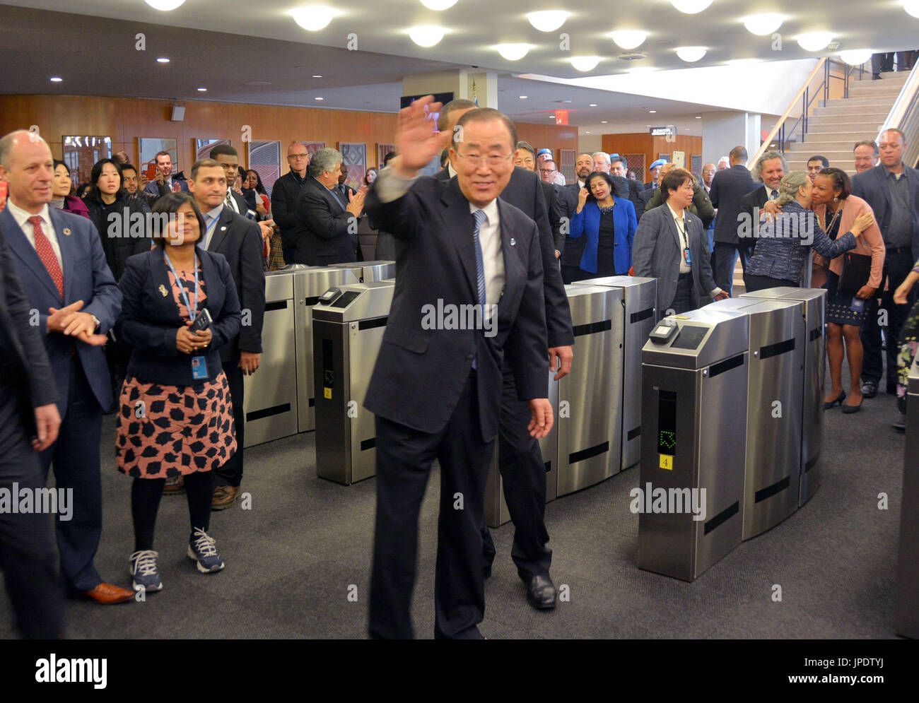 U.N. Secretary General Ban Ki Moon (C) leaves the U.N. headquarters in ...