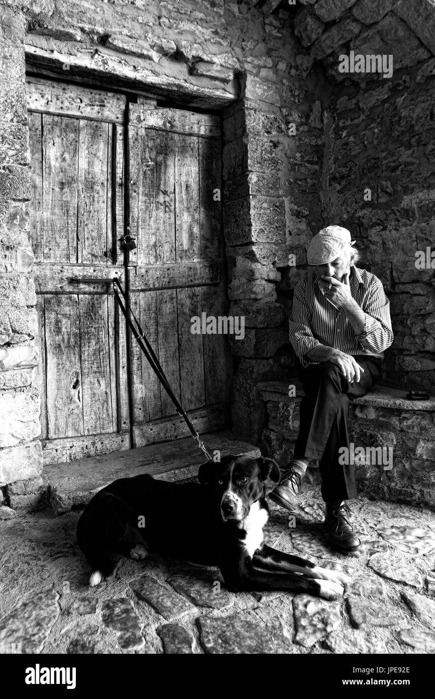 Europe, Italy,Umbria, Perugia district,Collepino Man's best friend Stock Photo