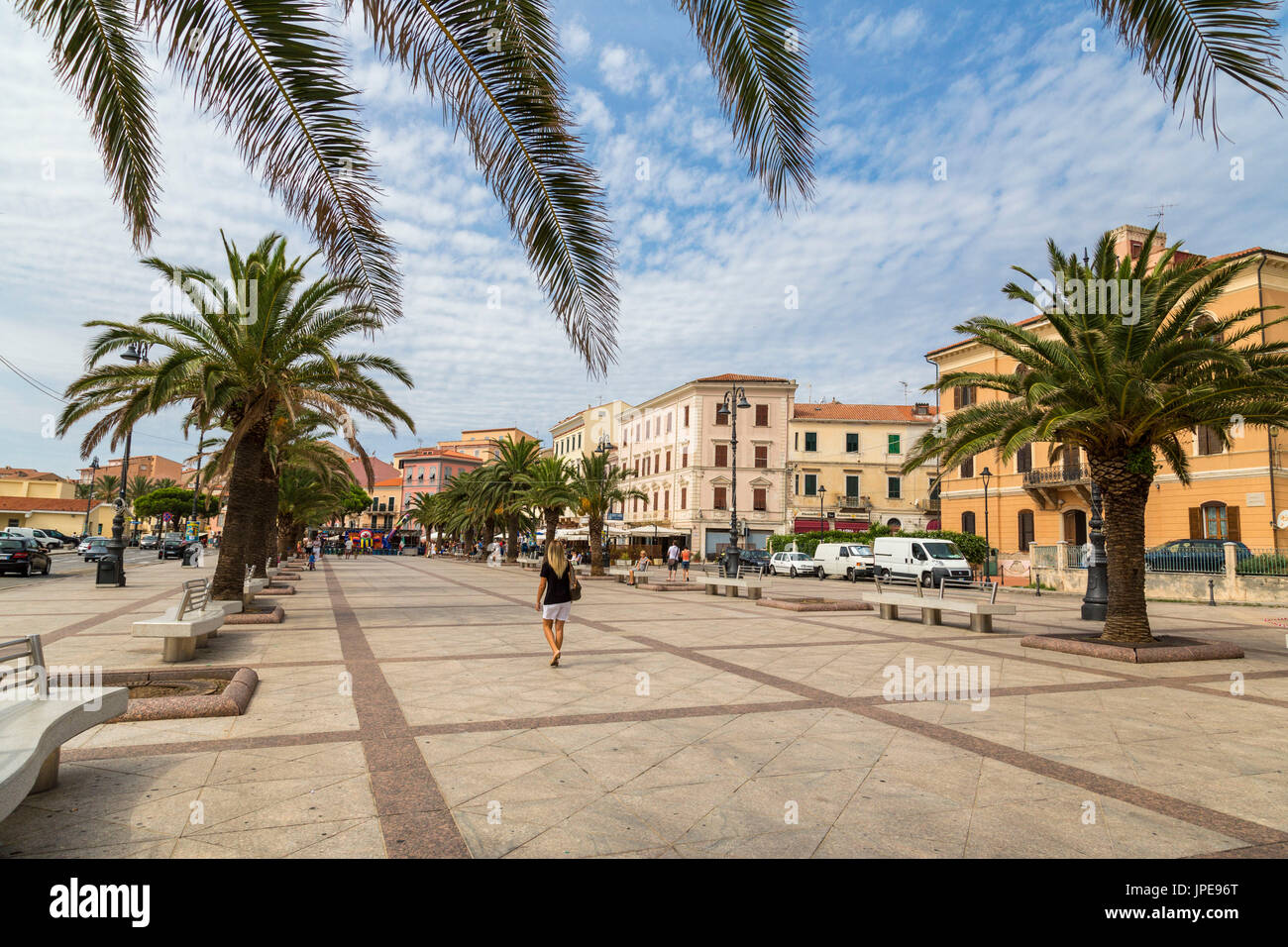 The promenade framed by palm trees Caprera  La Maddalena Island Sardinia Italy Europe Stock Photo