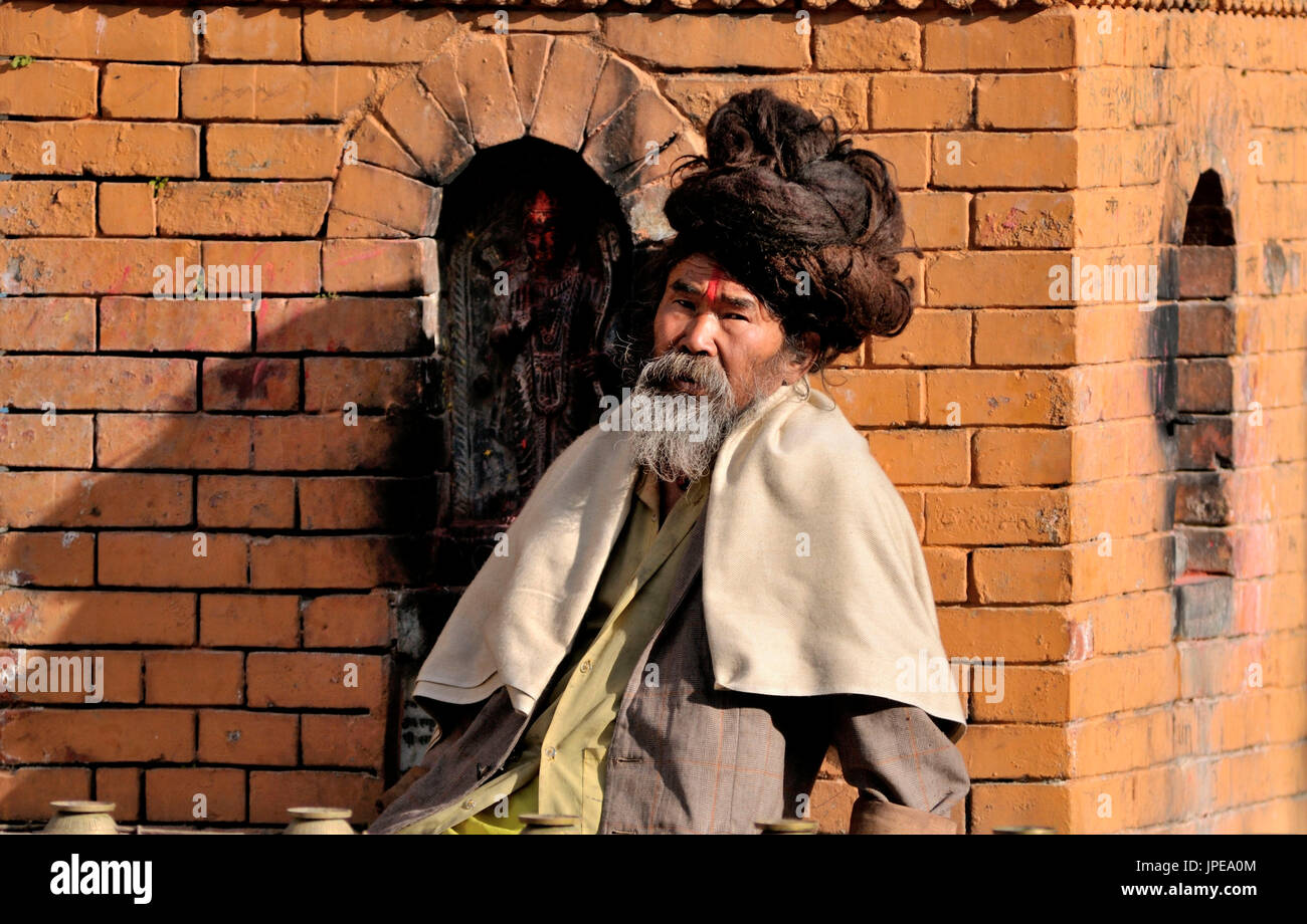 The watchful eye of a guardian in a temple in Panauti, Nepal. Stock Photo