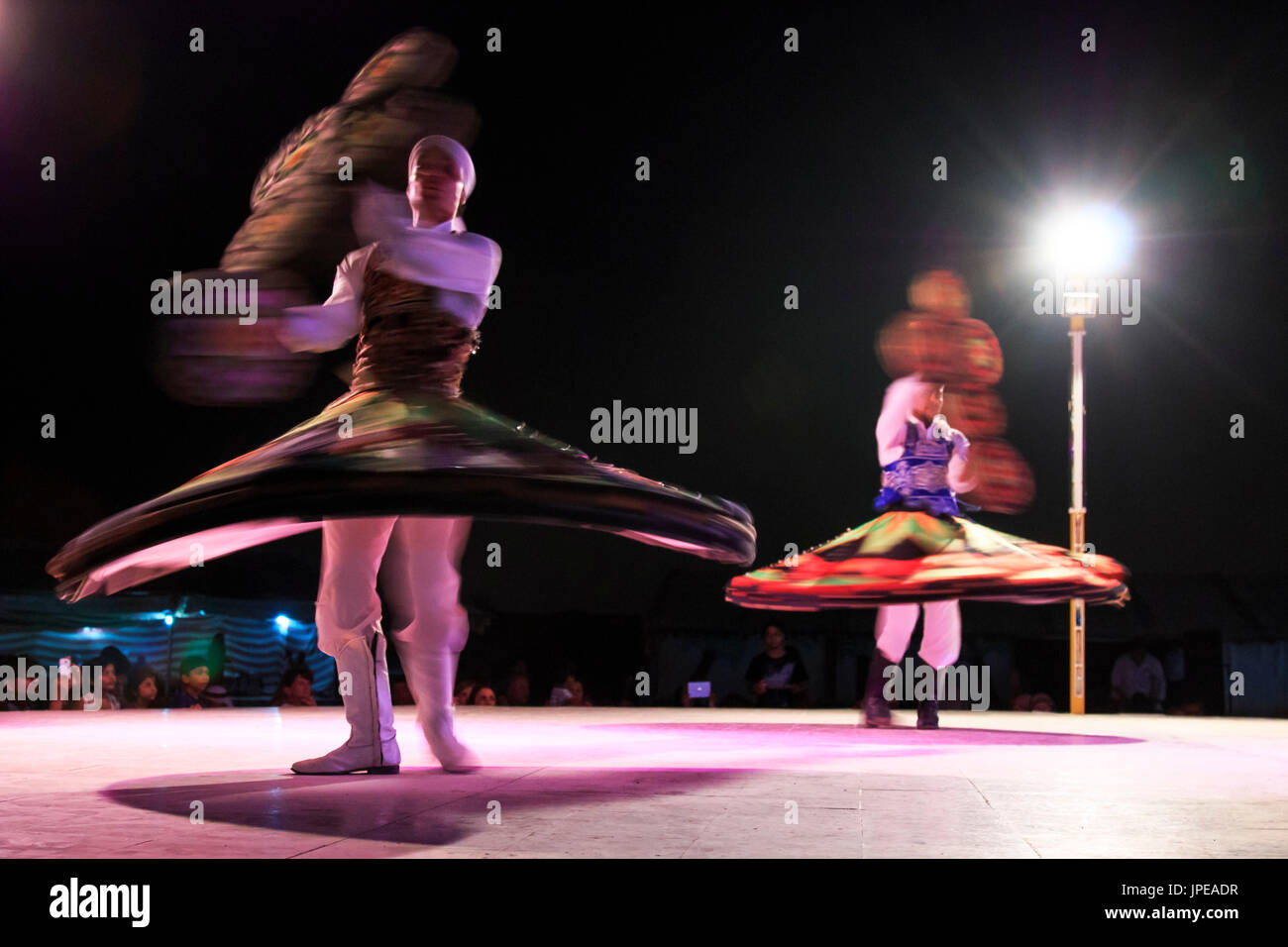 Dubai, United Arab Emirates. Arab dancer performing a 'turning dance' Stock Photo