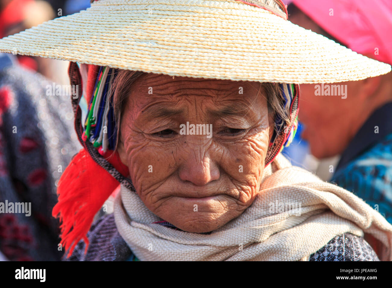 Chinese woman in ancient attire during the Heqing Qifeng Pear Flower festival, China Stock Photo