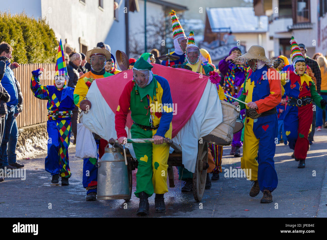 Masked characters parade through the village streets. Axamer Wampelerreiten, Axams, Inntal, Tirol, Osterreich(Austria), Europe Stock Photo