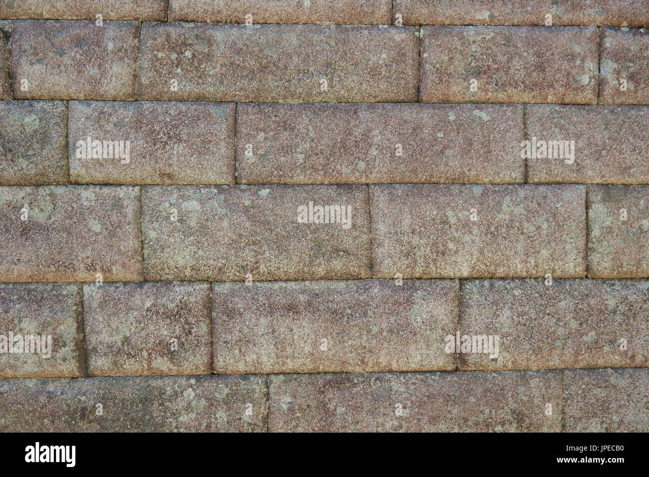 Gray stone brick wall background. Concrete block pattern Stock Photo