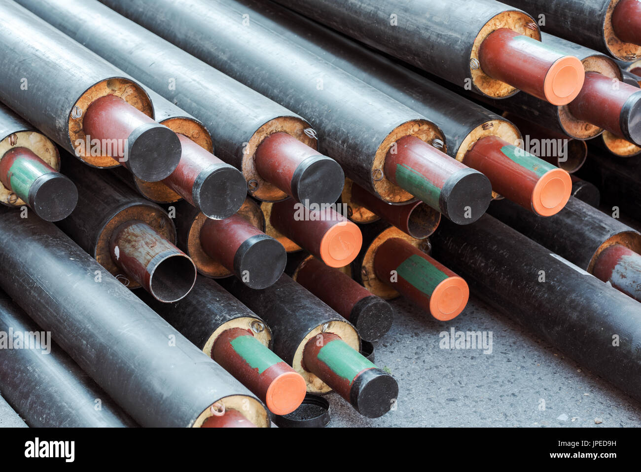 Industrial heat water pipes stack as abstract background Stock Photo