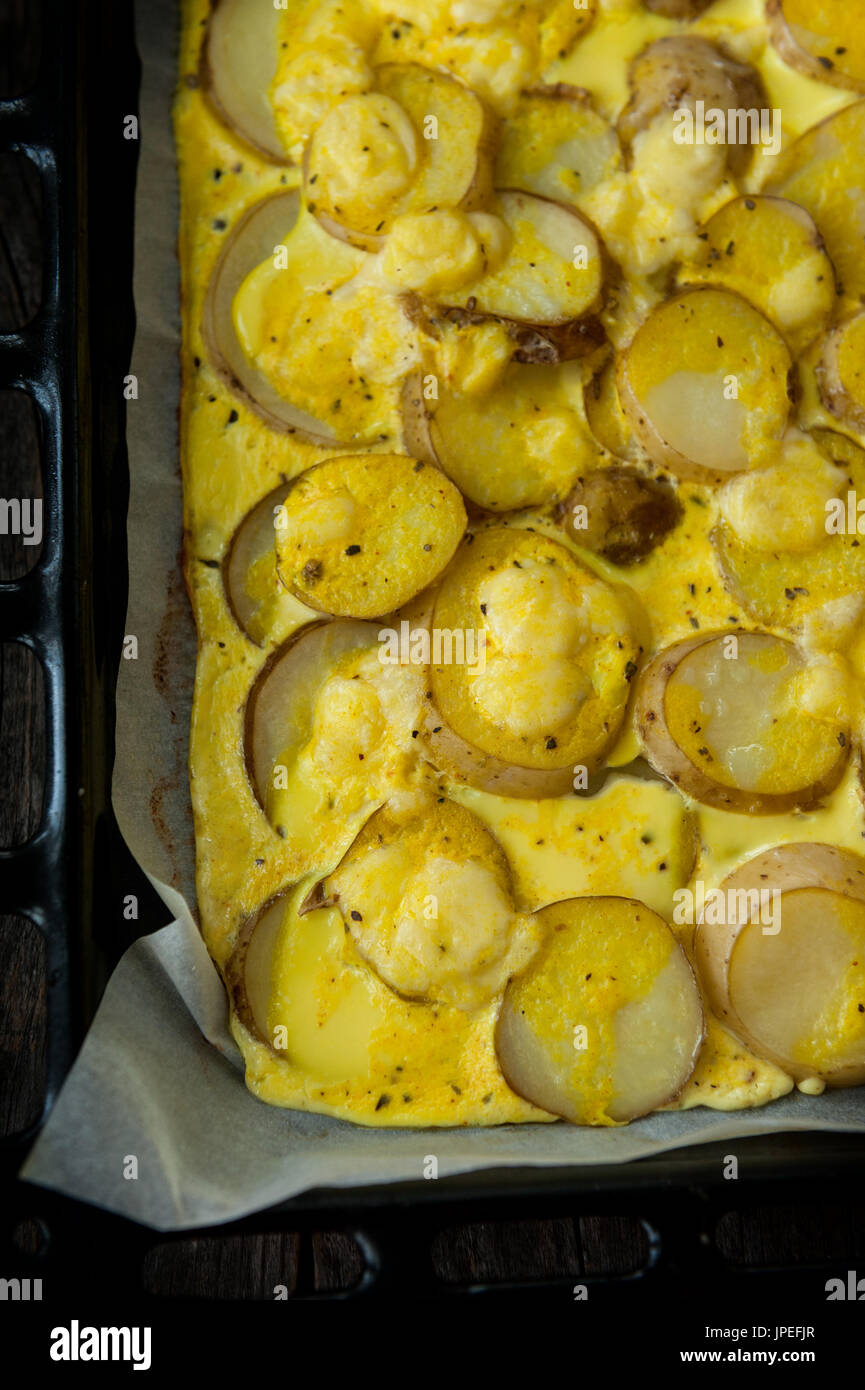 Baked chips potatoes with yogurt and egg Stock Photo Alamy