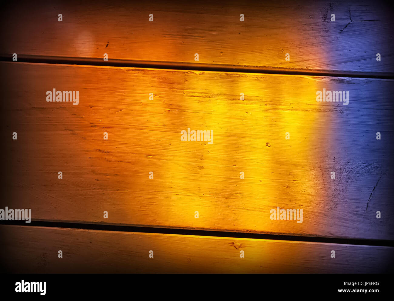 Wooden Floor Background With Multicolored Light From Stained Glass