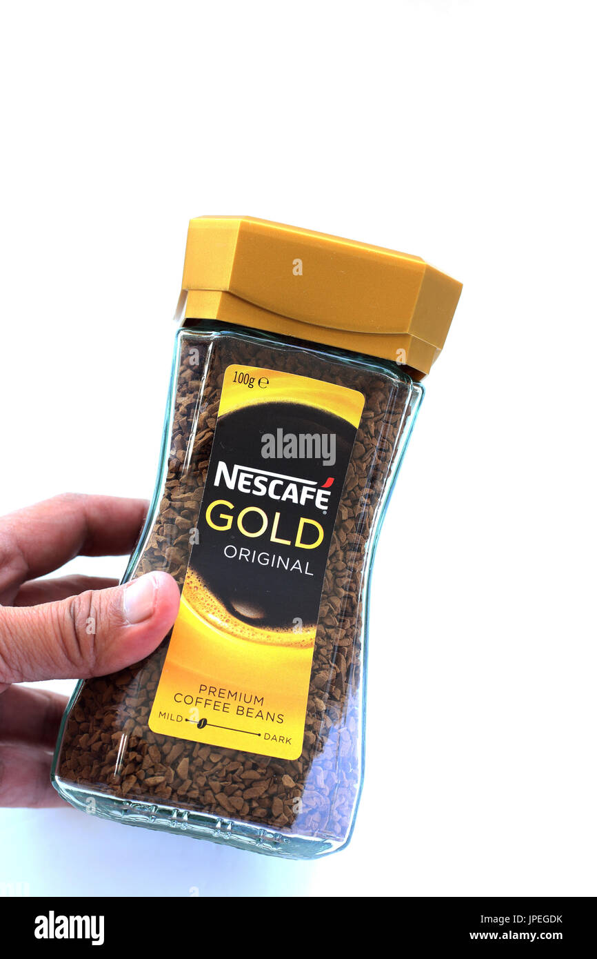 https://c8.alamy.com/comp/JPEGDK/close-up-of-nescafe-gold-coffee-isolated-against-white-background-JPEGDK.jpg