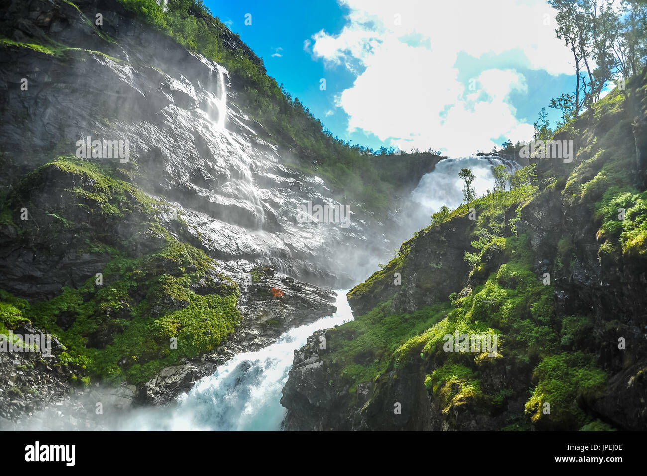 Beautiful view of Kjosfossen waterfall through the hill in Aurland, Norway Stock Photo