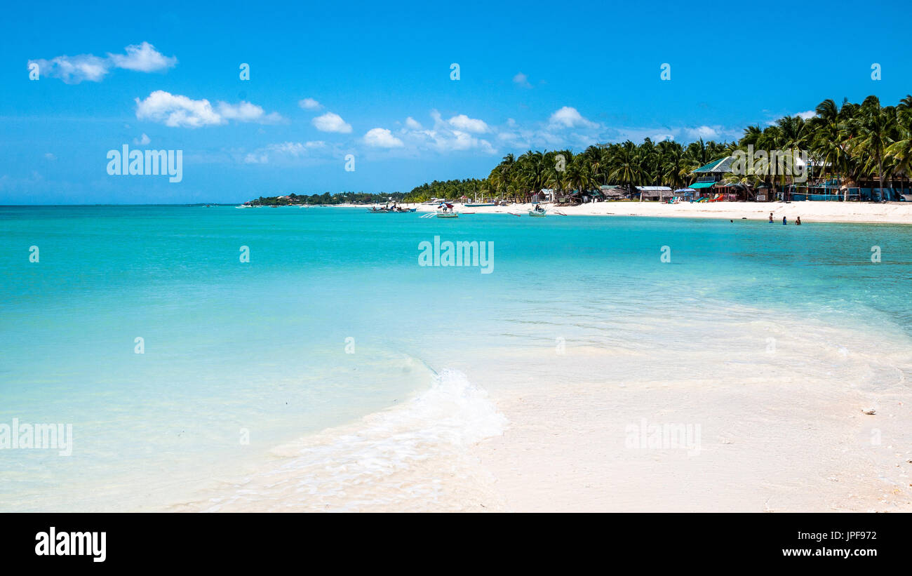 blue lagoon of Bantayan Island, bright white beachsand in the foreground, Philippines Stock Photo