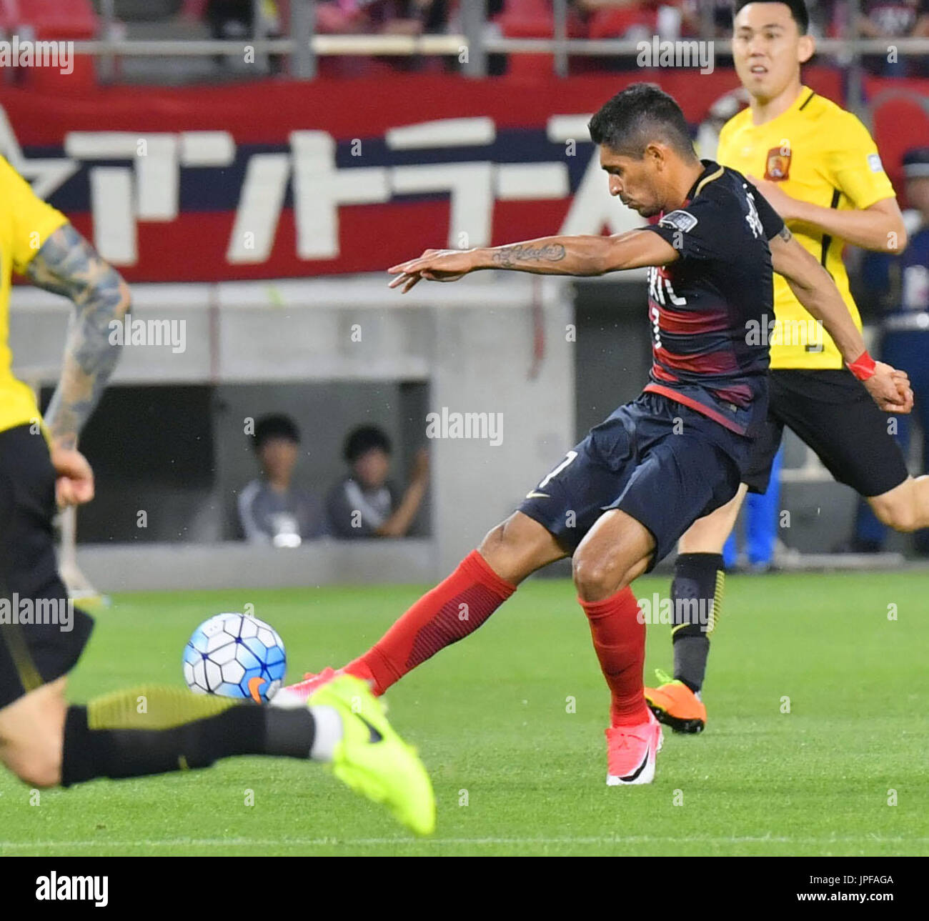 Japan's Kashima Antlers striker Pedro Junior scores the opening goal