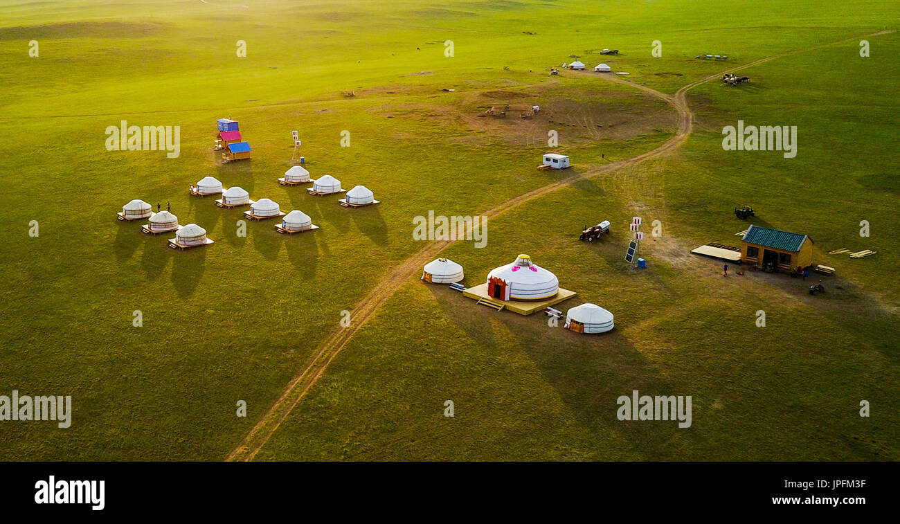 Hohhot. 17th July, 2017. Photo taken on July 17, 2017 shows Mongolian yurts in Hulun Buir grassland, in north China's Inner Mongolia Autonomous Region. A total of 30 billion yuan (4.47 billion U.S. dollars) had been invested to protect the ecosystem of grassland in the region from 2011 to 2016. Credit: Lian Zhen/Xinhua/Alamy Live News Stock Photo