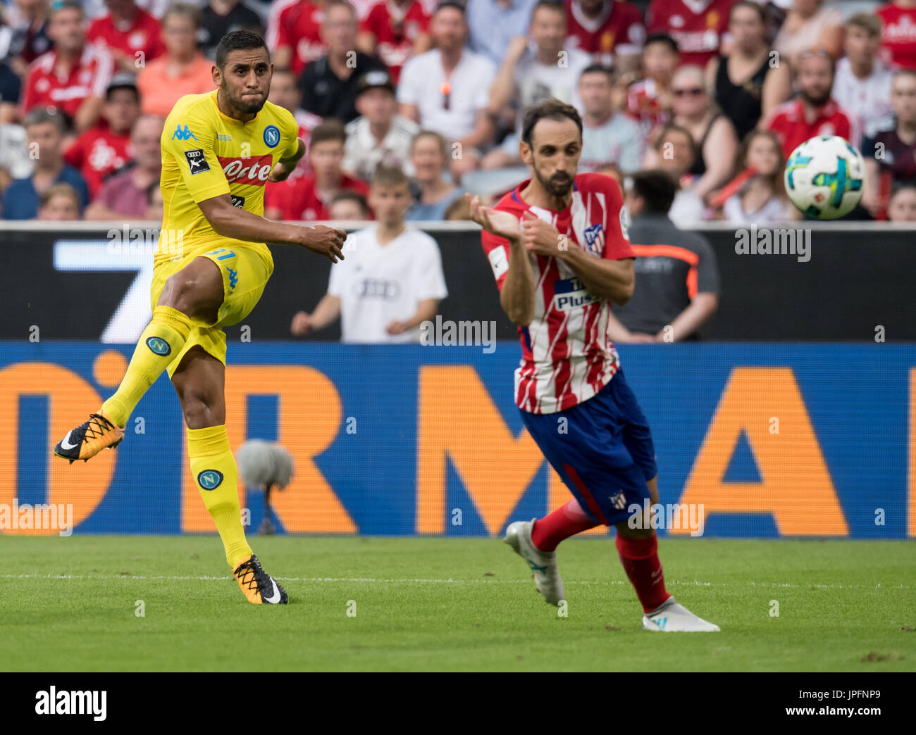 Munich, Germany. 01st Aug, 2017. Madrid's Juanfran (R) and Napoli's Faouzi Ghoulam vie for the ball during the Audi Cup semi-final match pitting Atletico Madrid vs SSC Napoli in the Allianz Arena in Munich, Germany, 01 August 2017. Photo: Sven Hoppe/dpa/Alamy Live News Stock Photo