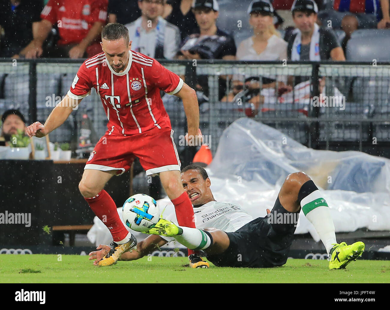 (170802) -- MUNICH, Aug. 2, 2017(Xinhua) -- Bayern Munich's Franck Ribery (L) vies with Liverpool's Joel Matip during a semifinal match of Audi Cup 2017 between Liverpool F.C. from England and Bayern Munich from Germany, in Munich, Germany, on Aug. 1, 2017. Liverpool won 3-0. (Xinhua/Philippe Ruiz) Stock Photo