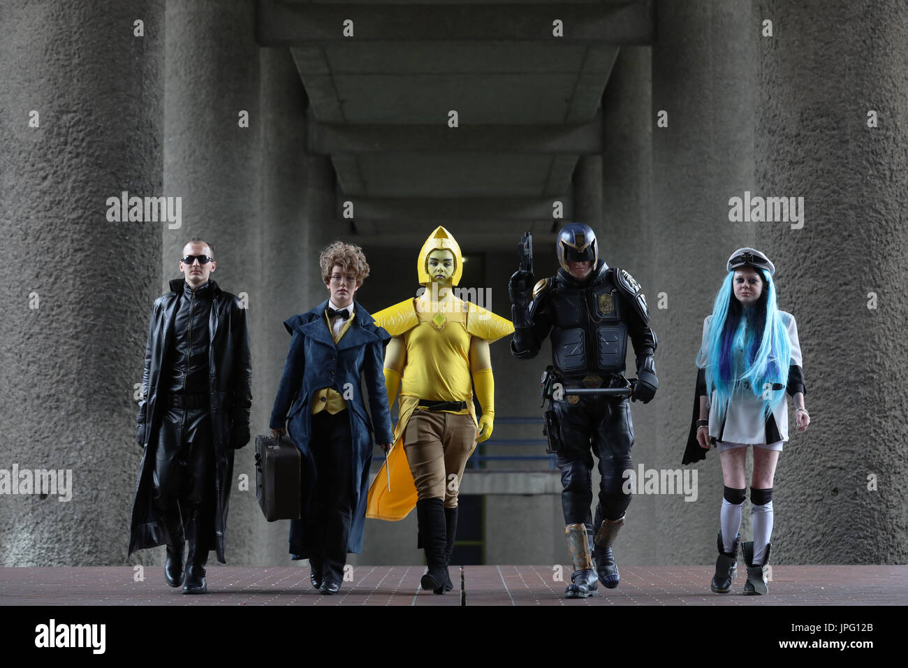 London, UK. 2nd Aug, 2017. Cosplayers pose as (L-R) Albert Wesker from Resident Evil, Newt Scamander from the Harry Potter franchise, Yellow Diamond from the Steven Universe, Judge Enza, a character based on the Judge Dredd franchise, and Esdeath from the anime Akame Ga Kill! respectively, during a photocall for the 'Into the Unknown : A Journey through Science Fiction' exhibition at the Barbican Centre in London, UK, Wednesday August 2, 2017. Credit: Luke MacGregor/Alamy Live News Stock Photo