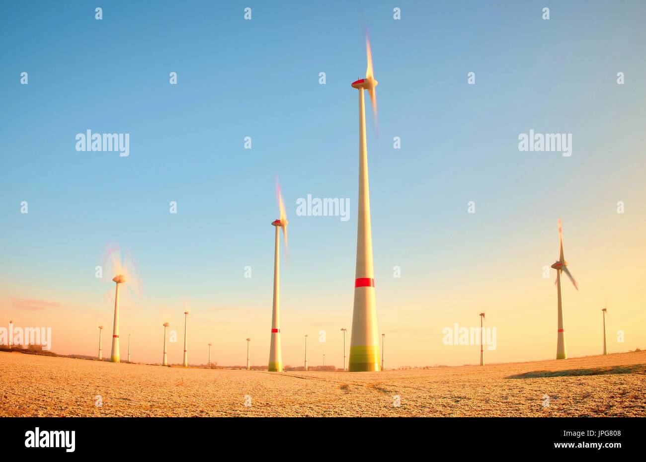 Wind Turbines Producing Electric Energy within sunny spring morning ...